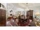 Open floor plan seamlessly connects the dining and living room, featuring elegant decor at 7955 E Chaparral Rd # 129, Scottsdale, AZ 85250