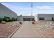 An exterior shot of a community building and desert landscaping at 9431 E Coralbell Ave # 192, Mesa, AZ 85208