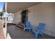 Inviting covered front porch with chairs and secure front door at 9431 E Coralbell Ave # 192, Mesa, AZ 85208