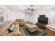 Living room showcasing neutral furniture, wood floors, and natural light at 9431 E Coralbell Ave # 192, Mesa, AZ 85208