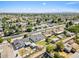 This aerial shows the charming neighborhood with well-maintained homes and beautiful landscaping at 1050 W 9Th Pl, Mesa, AZ 85201