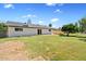 Spacious backyard featuring lawn and a brick perimeter wall at 1050 W 9Th Pl, Mesa, AZ 85201