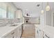 Updated kitchen with an island, stainless steel appliances, and backyard views at 1050 W 9Th Pl, Mesa, AZ 85201
