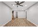 Large living room featuring wood-look floors and a staircase to the left at 1050 W 9Th Pl, Mesa, AZ 85201