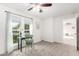 Bright bedroom with a window, natural light, and adjacent sitting area at 1058 E 2Nd St, Mesa, AZ 85203