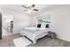 Bedroom with a window, a decorative rug, and modern furnishings at 1058 E 2Nd St, Mesa, AZ 85203