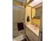 Functional bathroom with a vanity and walk-in shower; featuring a warm color palette for a welcoming atmosphere at 111 S Greenfield -- # 602, Mesa, AZ 85206
