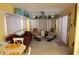 Comfortable living area with a ceiling fan, plush seating, and cheerful decor perfect for relaxing or entertaining guests at 111 S Greenfield -- # 602, Mesa, AZ 85206