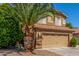 Charming two-story home featuring a tile roof, desert landscaping, and a spacious two-car garage at 1149 N Sunnyvale Ave, Gilbert, AZ 85234