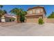 Charming two-story home featuring a tile roof, desert landscaping, and a spacious two-car garage at 1149 N Sunnyvale Ave, Gilbert, AZ 85234