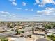 Neighborhood aerial shot showcasing a community with local business and scenic views at 1160 E Hampton Cir, Mesa, AZ 85204