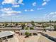 Property aerial view featuring surrounding neighborhood with mature trees and landscaping at 1160 E Hampton Cir, Mesa, AZ 85204