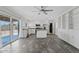 Modern kitchen with white cabinets, stainless steel appliances, and granite countertops at 1160 E Hampton Cir, Mesa, AZ 85204