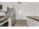 Spacious kitchen with stainless steel appliances, granite countertops, and tile floor at 1160 E Hampton Cir, Mesa, AZ 85204