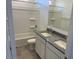 This bathroom features double sinks with granite countertops and a shower and bathtub combo at 1162 S Mullberry St, Florence, AZ 85132