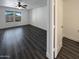 A neutral bedroom with wood-look floors and natural light at 1400 S Crossbow Ct, Chandler, AZ 85286