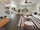 Bright living room with modern furniture, stylish rug, and natural light at 1400 S Crossbow Ct, Chandler, AZ 85286