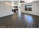 Expansive living room features modern hardwood floors and plenty of natural light at 1400 S Crossbow Ct, Chandler, AZ 85286