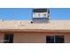 Roof view featuring a large air conditioning unit and desert landscaping at 1602 N 57Th Ave, Phoenix, AZ 85035