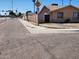 Quiet dead end street with a single story home featuring desert landscaping at 1602 N 57Th Ave, Phoenix, AZ 85035