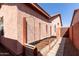 Exterior shot of backyard featuring raised garden beds and walkway at 16818 S 23Rd St, Phoenix, AZ 85048