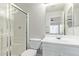 Well-lit bathroom with a glass-enclosed shower and modern vanity at 16818 S 23Rd St, Phoenix, AZ 85048