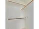 Well-organized walk-in closet with wooden shelves and ample storage at 16818 S 23Rd St, Phoenix, AZ 85048