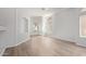 Spacious living room with hardwood floors and large windows at 16818 S 23Rd St, Phoenix, AZ 85048
