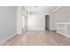 Bright, open living room with hardwood floors, white walls, and natural light at 16818 S 23Rd St, Phoenix, AZ 85048