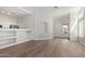 Open living area with hardwood floors leading to the entry door at 16818 S 23Rd St, Phoenix, AZ 85048
