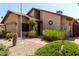 Attractive exterior of home, featuring desert landscaping, a brick walkway, and mature shrubs at 18610 N 45Th Ave, Glendale, AZ 85308