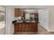 Bright kitchen with dark countertops, stainless steel appliances, and ample cabinet space at 18610 N 45Th Ave, Glendale, AZ 85308