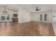 Bright open-plan living area with a breakfast bar and view of the backyard at 18610 N 45Th Ave, Glendale, AZ 85308