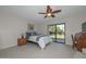 Bedroom with a ceiling fan and tile floors at 19120 N 98Th Ln, Peoria, AZ 85382