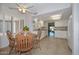 Bright kitchen with tile floors, granite countertops, and breakfast nook area at 19120 N 98Th Ln, Peoria, AZ 85382