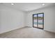 Bedroom featuring tile floors and a sliding glass door leading to the pool at 1925 E Lane Ave, Phoenix, AZ 85020