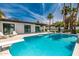 Beautiful backyard with a diving board that leads to the sparkling pool, perfect for Gathering fun at 1925 E Lane Ave, Phoenix, AZ 85020