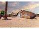Backyard featuring desert landscaping and a patio with a privacy lattice at 1943 E San Tan St, Chandler, AZ 85225