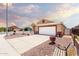 Well-maintained single-story home with desert landscaping and a two-car garage at 1943 E San Tan St, Chandler, AZ 85225