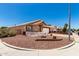Charming single-story home with well-maintained landscaping, decorative fountain, and a two-car garage at 1943 E San Tan St, Chandler, AZ 85225