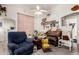 Cozy living room featuring a comfortable recliner and an organ at 1943 E San Tan St, Chandler, AZ 85225
