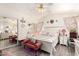Comfortable main bedroom with floral bedding, mirrored closet and ceiling fan at 1943 E San Tan St, Chandler, AZ 85225