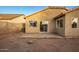 A spacious backyard with a concrete patio, ready for outdoor entertaining and relaxation at 1952 N 103Rd Dr, Avondale, AZ 85392