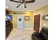 Cozy living room featuring tile flooring, dark wood accents, and neutral paint at 2014 N 17Th Pl, Phoenix, AZ 85006