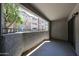 Covered outdoor balcony with view of apartment building at 2025 E Campbell Ave # 137, Phoenix, AZ 85016