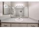 Well-lit bathroom vanity with a large mirror and ample counter space, enhancing everyday routines at 2025 E Campbell Ave # 137, Phoenix, AZ 85016