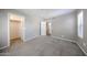 Bedroom with neutral walls, carpet and a walk in closet at 2025 E Campbell Ave # 137, Phoenix, AZ 85016