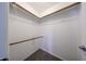 Spacious walk-in closet with ample shelving and rod space for optimal organization at 2025 E Campbell Ave # 137, Phoenix, AZ 85016