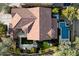 Stunning aerial view of the property showcasing the tile roof, pool, manicured landscaping, and outdoor living spaces at 21105 N 37Th Run, Phoenix, AZ 85050