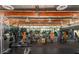 Well-equipped fitness center with various exercise machines and weights for a comprehensive workout experience at 21105 N 37Th Run, Phoenix, AZ 85050
